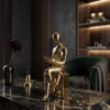 Elegant Reading Figure Sculpture